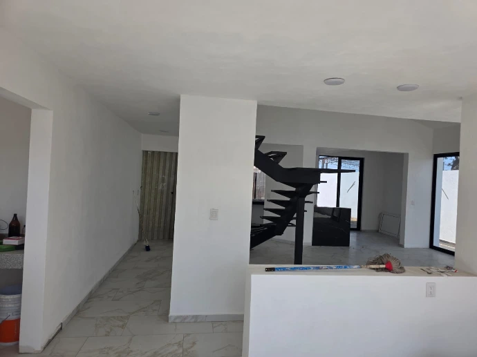 ala comedor con doble altura en casa en venta en San Juan del Rio
